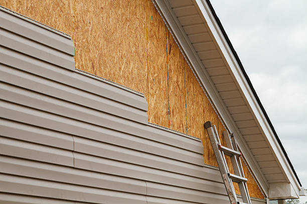 Professional Emergency Siding Repair technician working in Frenchville, PA